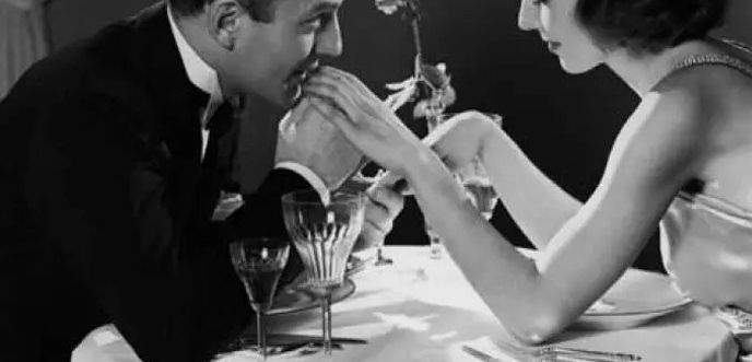 Gentlemen take out a girl for a dinner date in London 